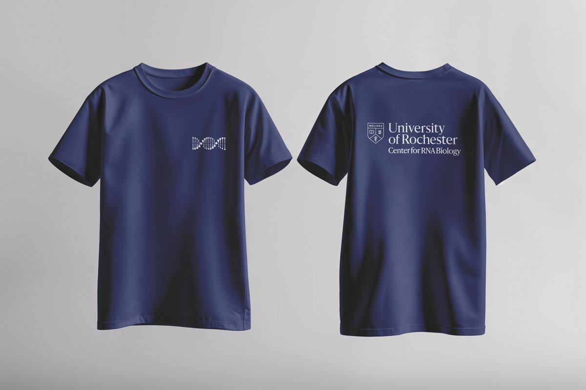 University of Rochester t-shirt featuring the university logo and colors, showcasing school pride and spirit.