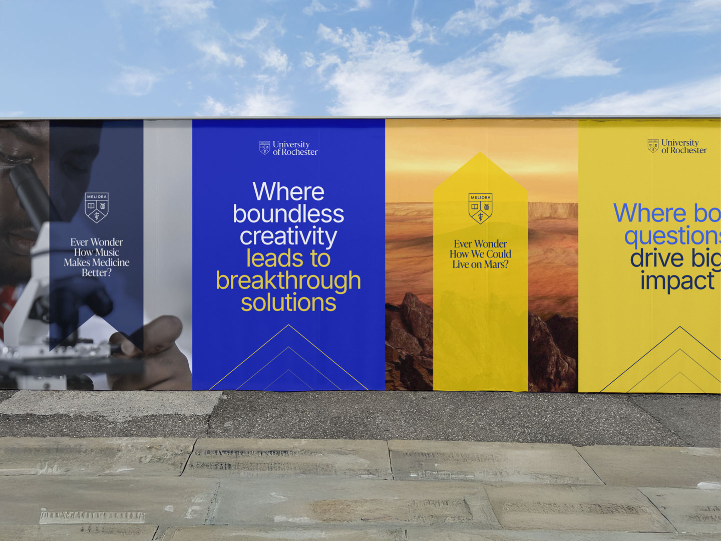 A large billboard featuring a man and a woman smiling together against a vibrant background.